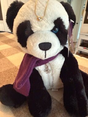 14k gold necklace with small diamond. 
Purchase at Ben Bridge.